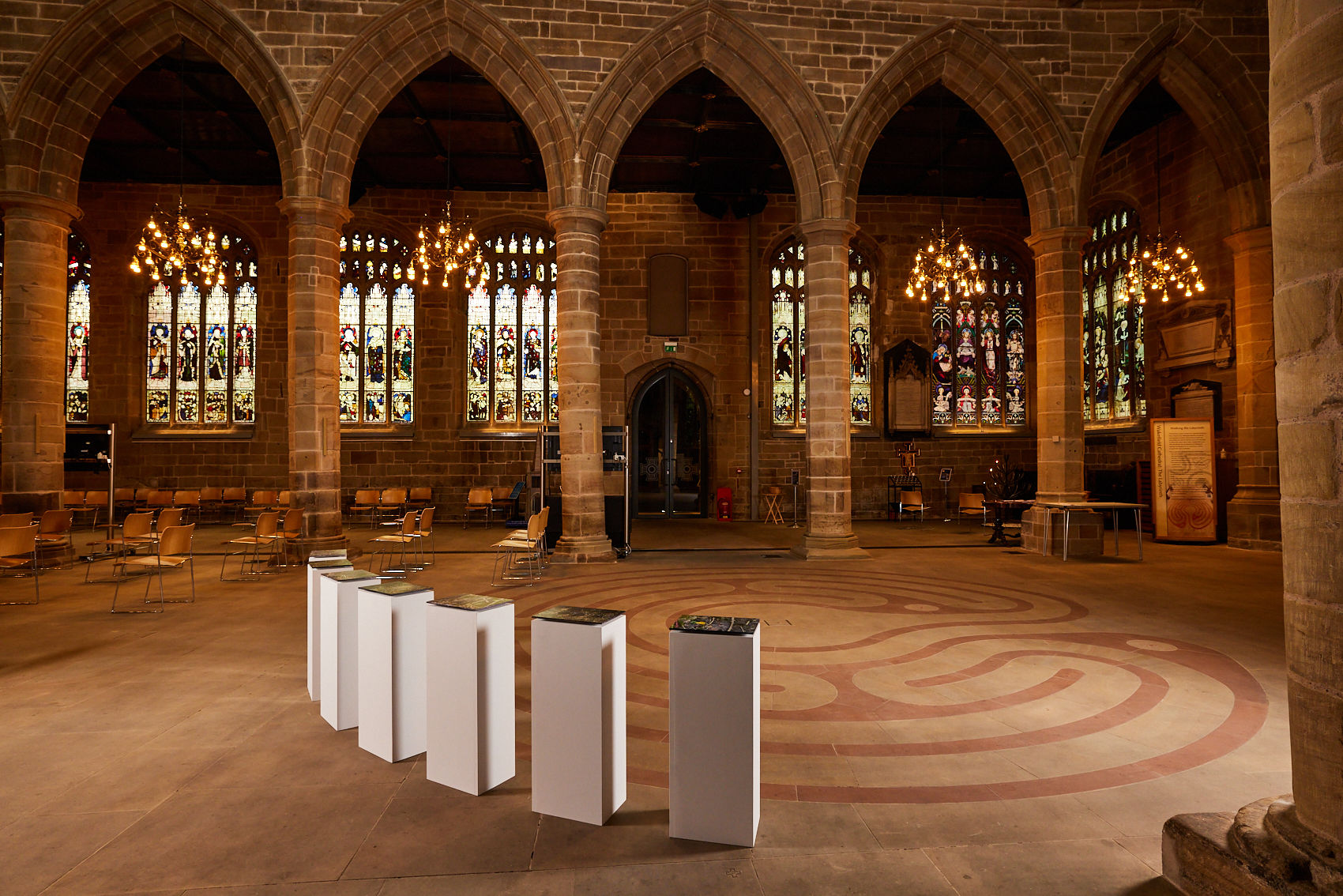 Interior of Wakefield Cathedral with detail of exhibition by Helen Thomas